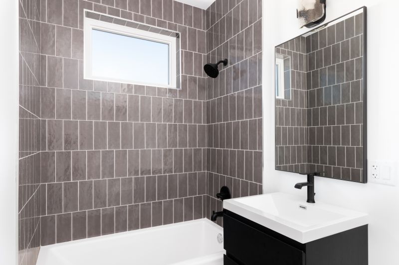 Bathroom with Custom Tile Work and Accent Wall